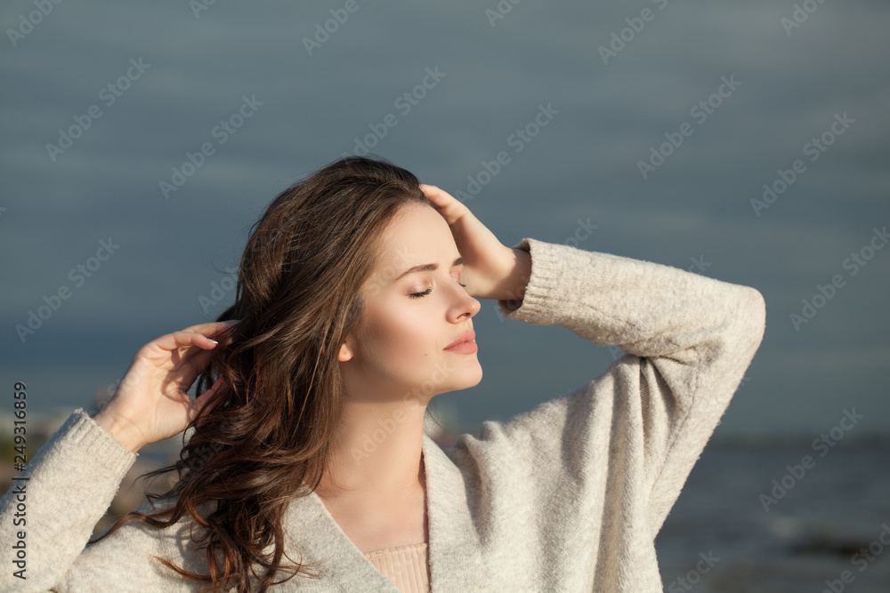 Young woman outdoor. Natural beauty, relaxation and meditation concept