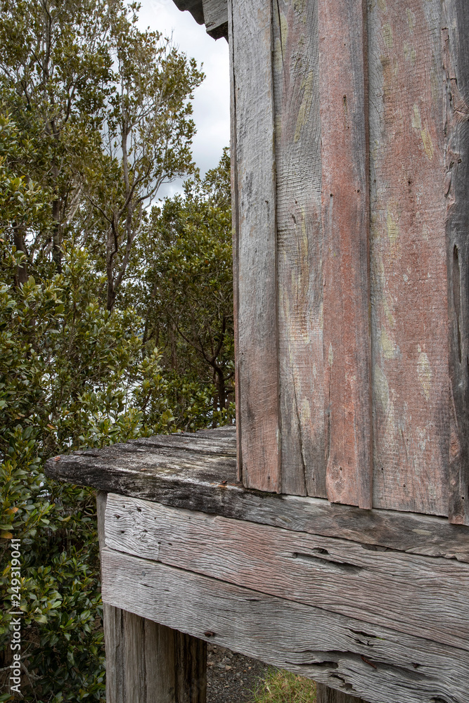 Kohukohu Hokianga river New Zealand. Wooden shelves Kohukohu Hokianga river New Zealand. Wooden shelves
