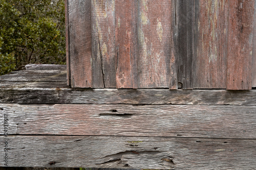 Kohukohu Hokianga river New Zealand. Wooden shelves photo