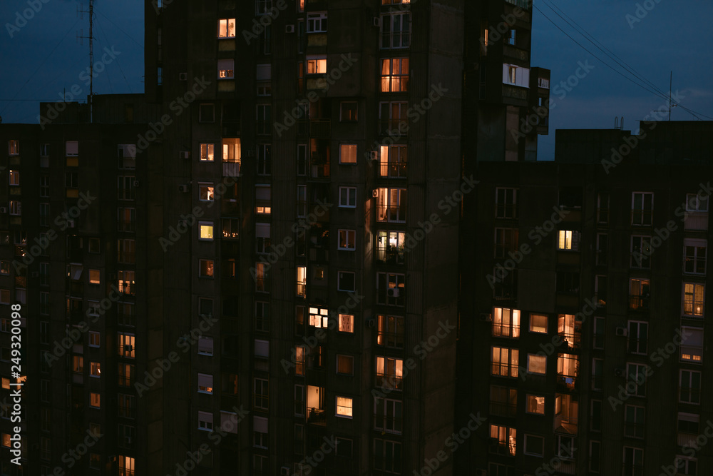 Concrete residential building at night. Concrete residential building at night.