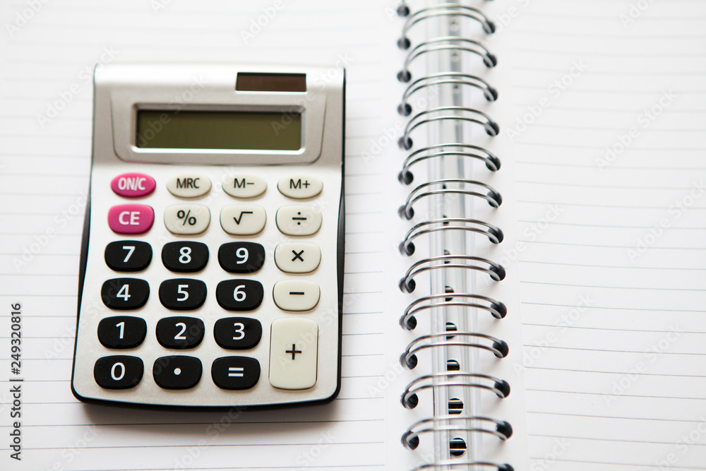 calculatrice calculette sur cahier a spirales Stock Photo