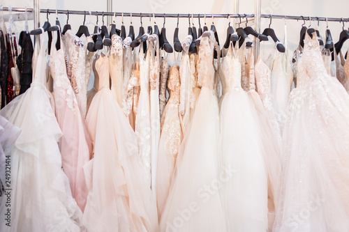 Stand with beautiful wedding dresses.