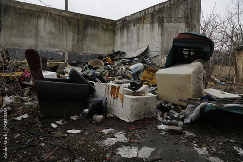 Environmental problems and nature pollution. Waste dumped in the city, an illegal social issue. Rubbish, garbage, outdoor, city, landscape, city space, abandoned