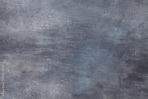 Grunge canvas coated with aqua blue and grey acrylic paint with texture strok...