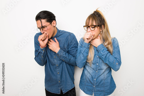 Young couple with glasses is suffering with cough and feeling bad