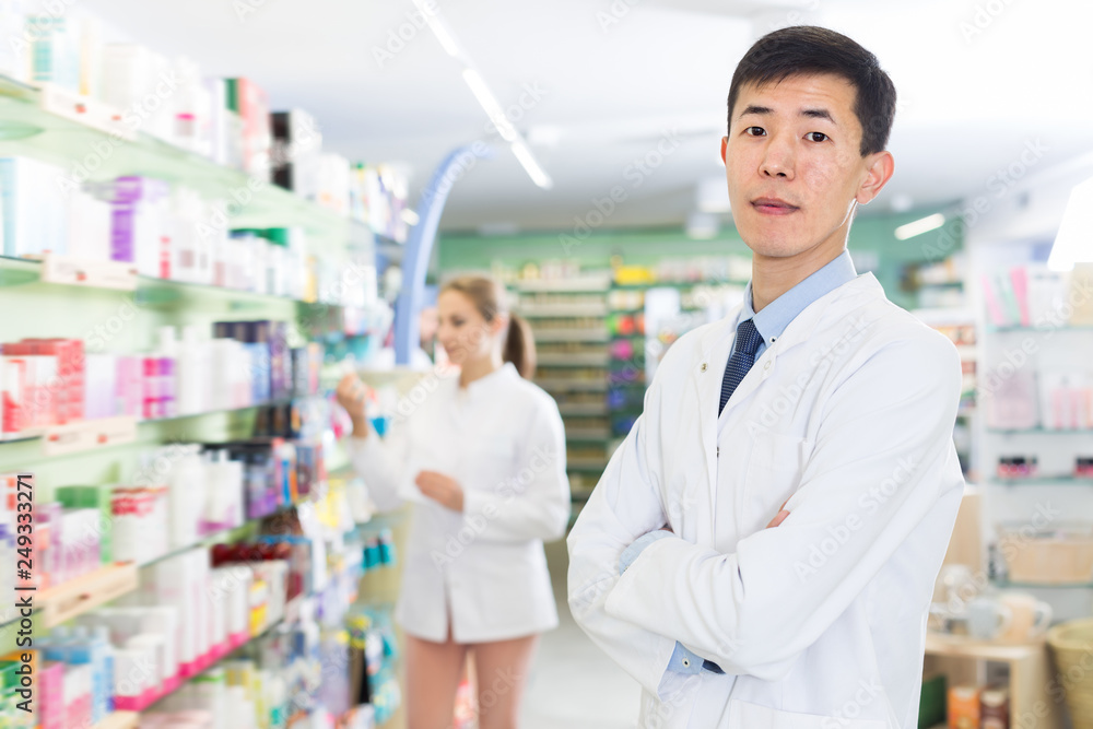 Adult korean man is standing with medicines