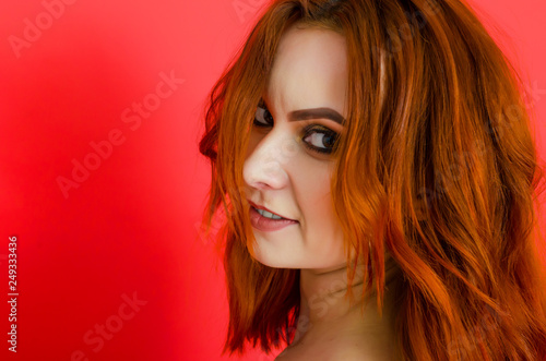 Sexy nude woman on red background. Close-up portrait. Cosmetology. Care. Women's health. Sexuality.