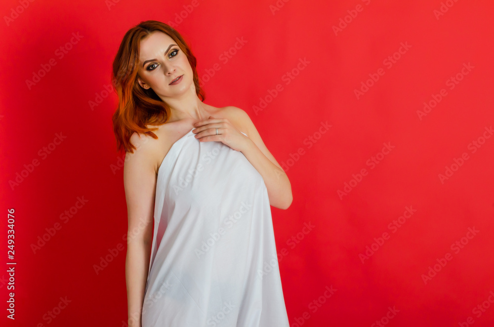 Sexy nude woman on red background. Cosmetology. Care. Women's health. Sexuality. Sexy nude woman on red background. Cosmetology. Care. Women's health. Sexuality.