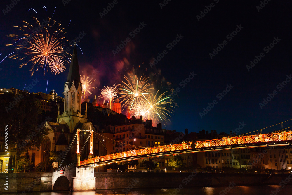 Fireworks lit up night sky over Saone River, Lyon