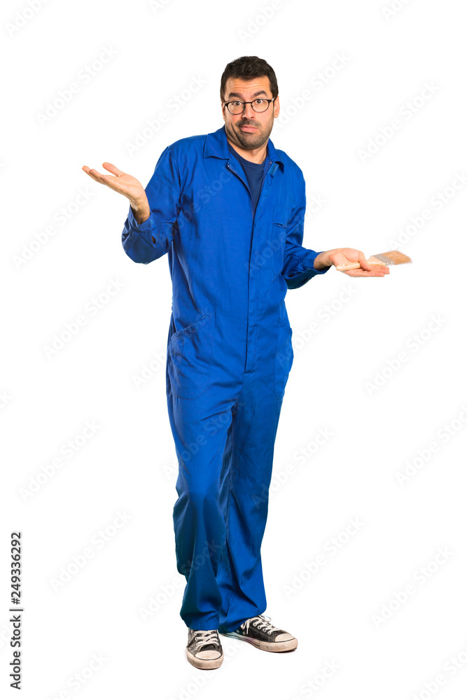 A full-length shot of a Painter man unhappy and frustrated with something because not understand something on isolated white background A full-length shot of a Painter man unhappy and frustrated with something because not understand something on isolated white background