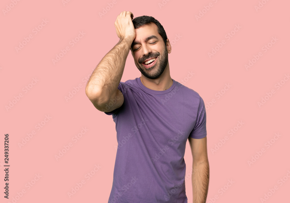 Handsome man has just realized something and has intending the solution on isolated pink background Handsome man has just realized something and has intending the solution on isolated pink background