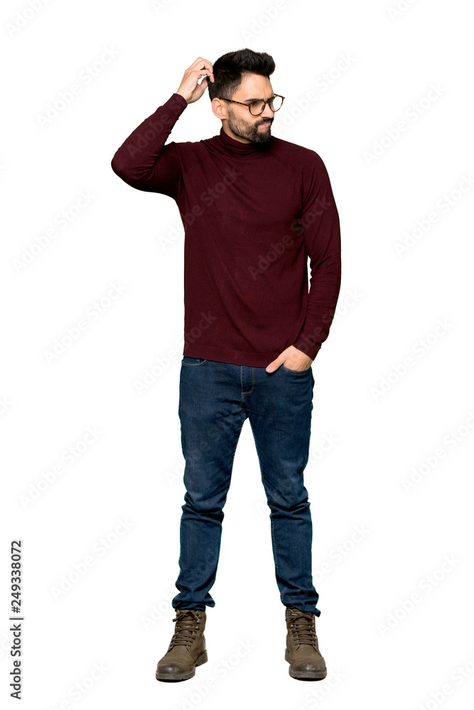 Full-length shot of Handsome man with glasses having doubts while scratching head on isolated white background Full-length shot of Handsome man with glasses having doubts while scratching head on isolated white background