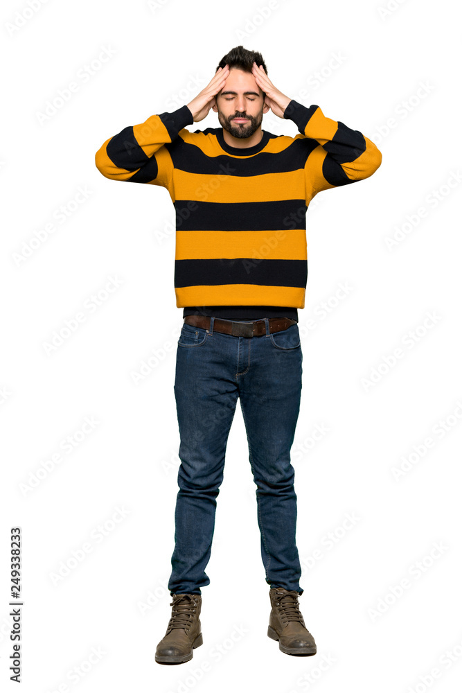 Full-length shot of Handsome man with striped sweater unhappy and frustrated with something on isolated white background Full-length shot of Handsome man with striped sweater unhappy and frustrated with something on isolated white background