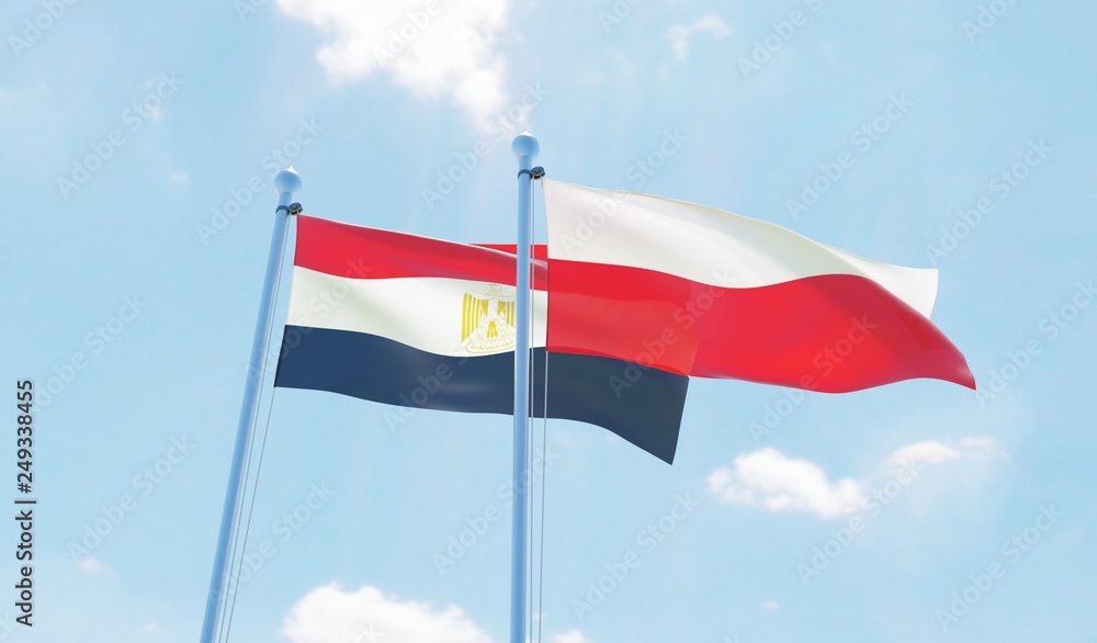 Poland and Egypt, two flags waving against blue sky. 3d image Poland and Egypt, two flags waving against blue sky. 3d image