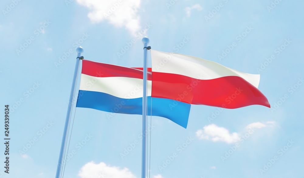 Poland and Netherlands, two flags waving against blue sky. 3d image Poland and Netherlands, two flags waving against blue sky. 3d image