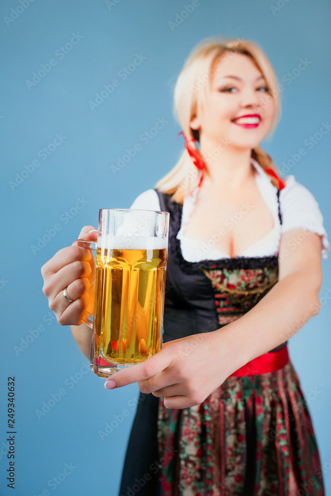 portrait of beautiful blonde cheerful smilnig woman in bavarian (Germany, Europe) traditional national dress portrait of beautiful blonde cheerful smilnig woman in bavarian (Germany, Europe) traditional national dress