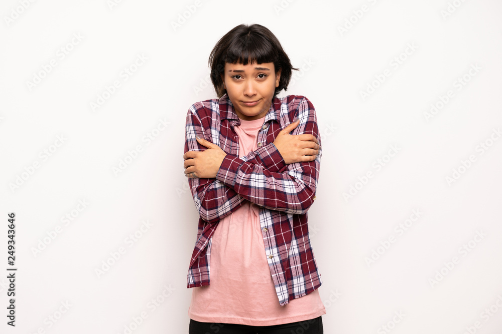 Young woman with short hair freezing Young woman with short hair freezing