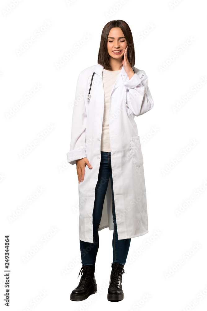 A full-length shot of a Young doctor woman with toothache over isolated white background A full-length shot of a Young doctor woman with toothache over isolated white background