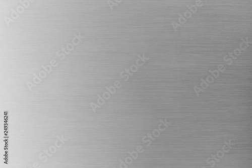 Brushed metal texture or brushed aluminum background. Abstract industrial background. Copy space for text.