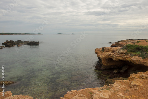 The sea of Ibiza a very cloudy day photo