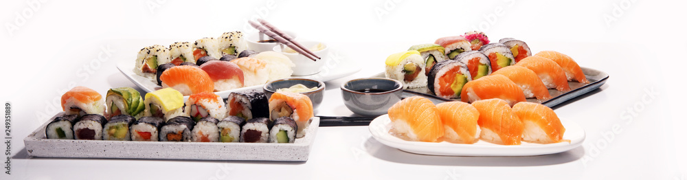 close up of sashimi sushi set with chopsticks and soy - sushi roll with salmon and sushi roll with smoked eel close up of sashimi sushi set with chopsticks and soy - sushi roll with salmon and sushi roll with smoked eel