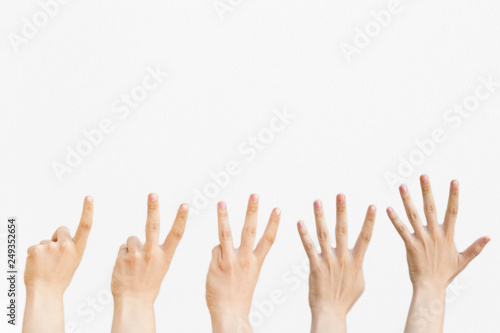 Male hands counting from one to five isolated on white background.