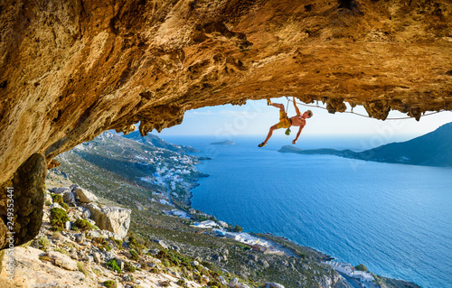 Climbing Sport fitness athlete on beautiful rocks.Travel destination Greece.