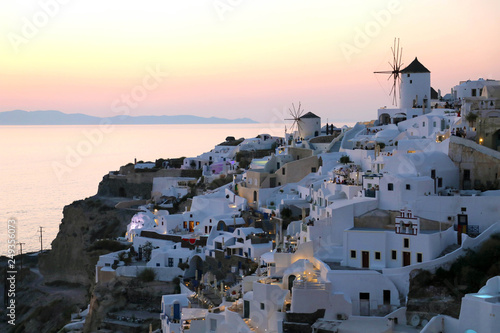 Fabulous picturesque village of Oia in Santorini island at sunset, Greece