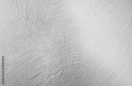 Plaster work on a wall showing the textured finish - In black and white