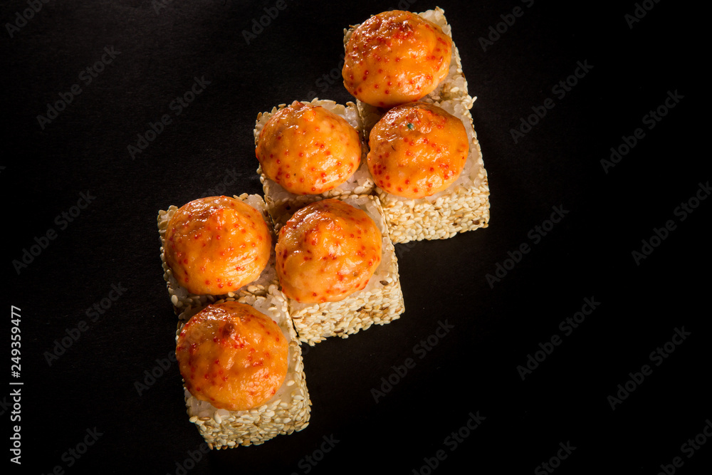 top view baked roll with salmon, green onion and cheese sauce top view baked roll with salmon, green onion and cheese sauce