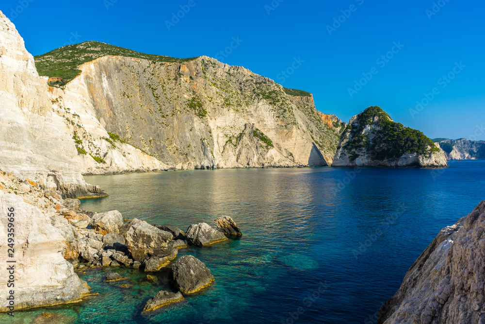 Fototapeta premium Greece, Zakynthos, Pretty cape plakaki bay surrounded by tall cliffs