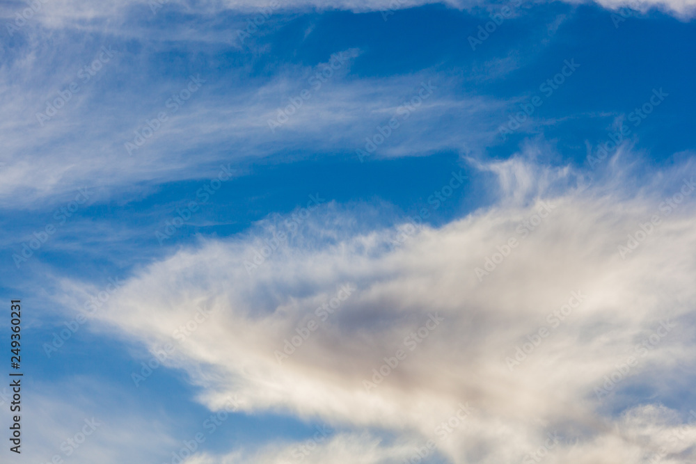 white clouds in the blue sky, clear weather, Sunny day. for the background, design, copy space