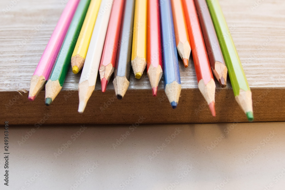 Obraz premium color pencils and paper background