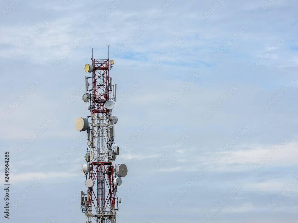 Kuala Lumpur, Malaysia - February 13, 2019 : Telecommunications or Communication transmitter tower with blue sky. Selective focus and crop fragment