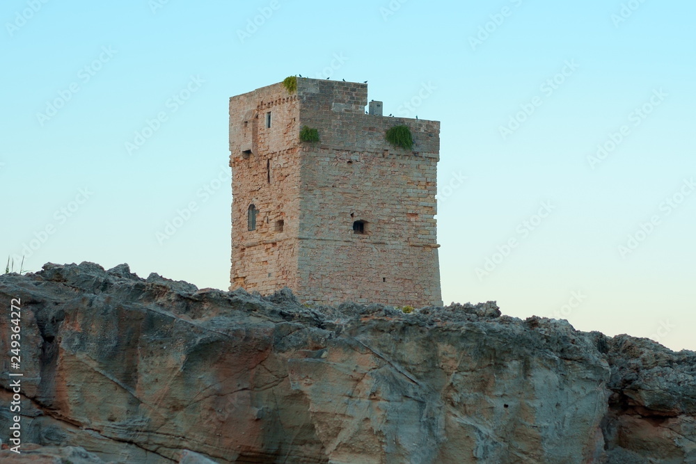 Tower on the rocky shore