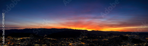 Sunrise panoramic view of City and Mountains © Mark