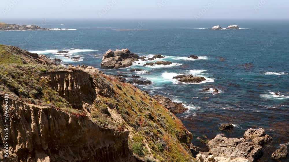 The beauty of California’s Big Sur coast is seen as waves break on its rugged and rocky shoreline in this seamlessly looping footage shot near Sorberanes Point with Lobos Rock visible. The beauty of California’s Big Sur coast is seen as waves break on its rugged and rocky shoreline in this seamlessly looping footage shot near Sorberanes Point with Lobos Rock visible.