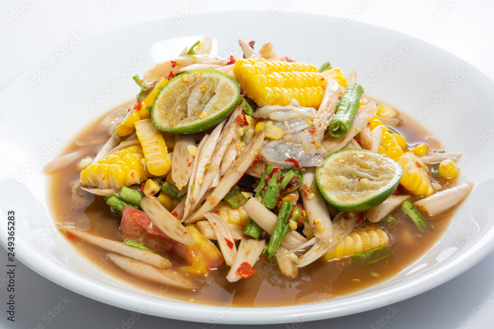 papaya salad (Som Tum) from Lotus root, add fresh shrimp and corn,very hot and spicy Thai  Food.