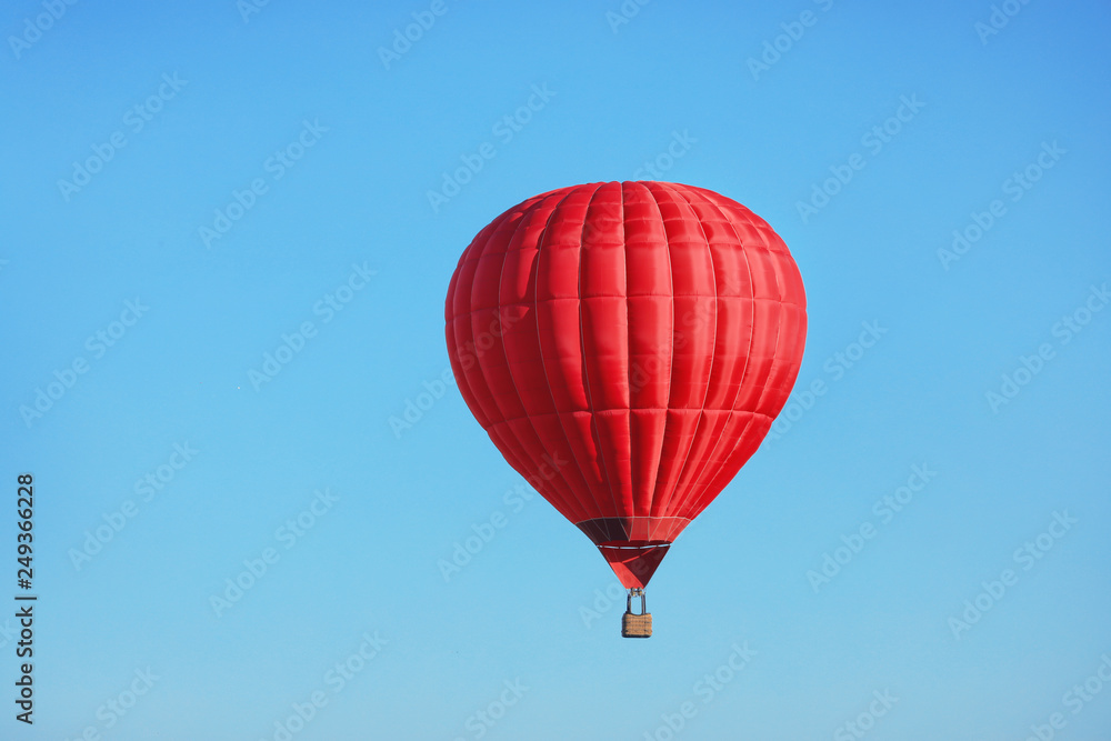 Beautiful view of hot air balloon in blue sky Beautiful view of hot air balloon in blue sky