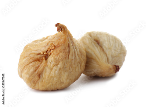 Tasty figs on white background. Dried fruit as healthy food