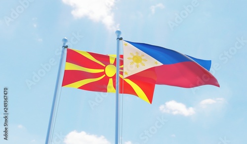 Philippines and Macedonia, two flags waving against blue sky. 3d image