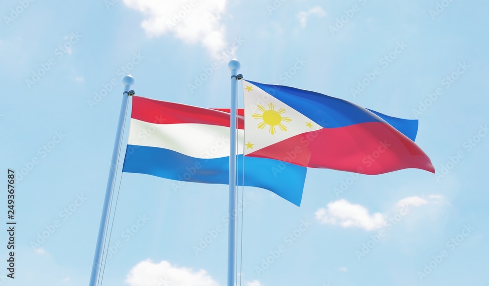 Philippines and Netherlands, two flags waving against blue sky. 3d image Philippines and Netherlands, two flags waving against blue sky. 3d image