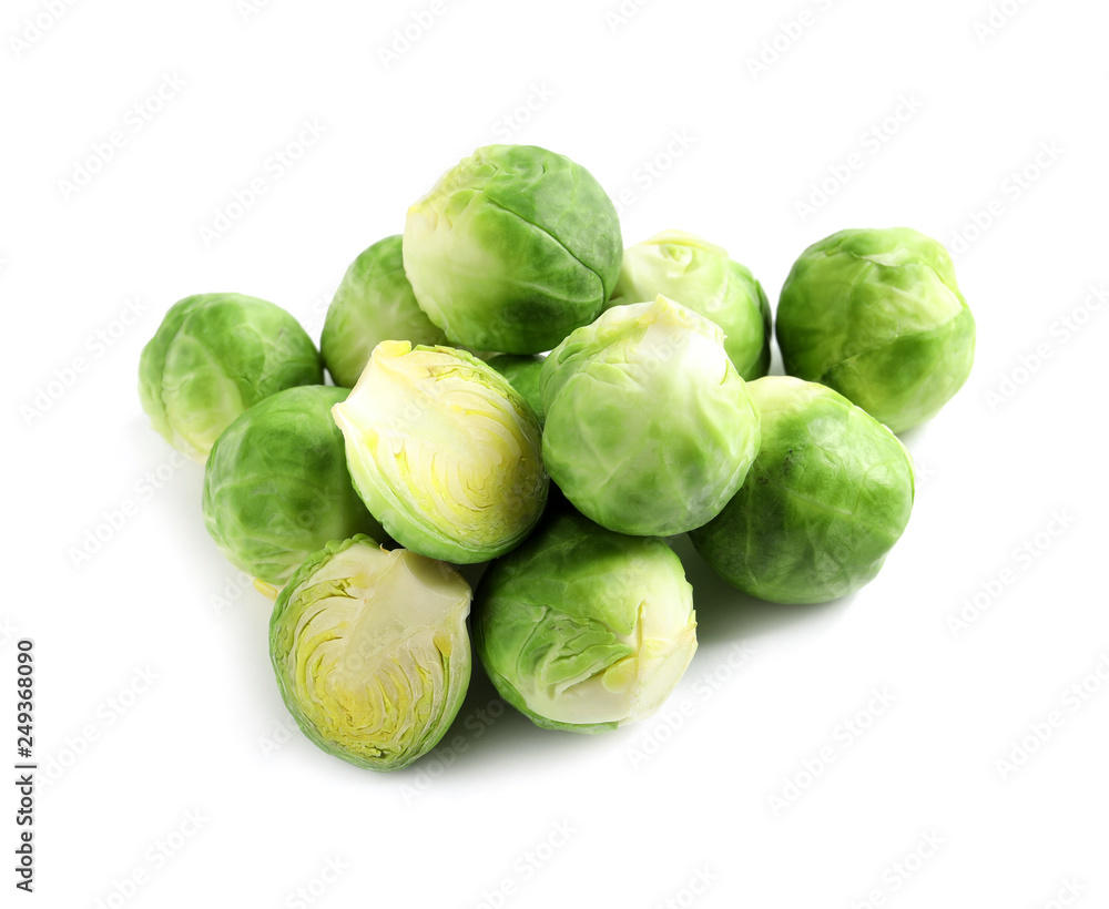 Pile of fresh Brussels sprouts isolated on white Pile of fresh Brussels sprouts isolated on white