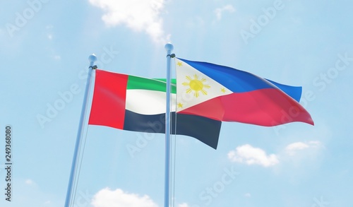 Philippines and UAE, two flags waving against blue sky. 3d image