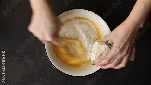 dough add flour mix, Stir (raw dough - ingredients). Footage photo