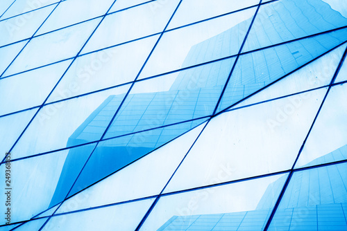 Close-up of glass windows of skyscrapers