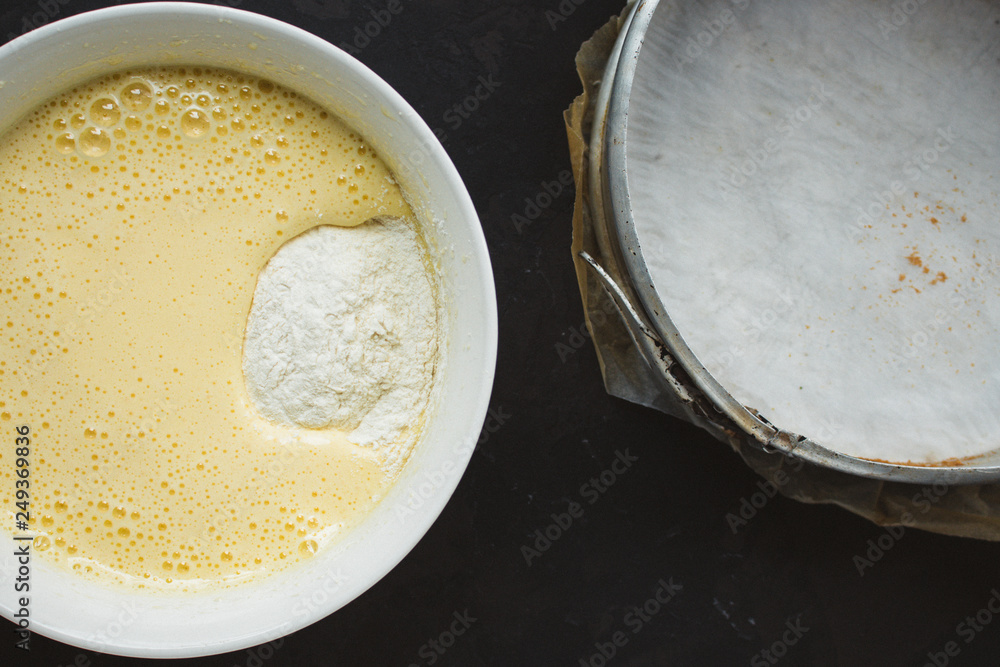 raw dough mix ingredients (eggs, flour and others). food background. copy space raw dough mix ingredients (eggs, flour and others). food background. copy space