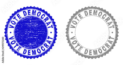 Grunge VOTE DEMOCRAT stamp seals isolated on a white background. Rosette seals with grunge texture in blue and gray colors. Vector rubber stamp imitation of VOTE DEMOCRAT text inside round rosette.