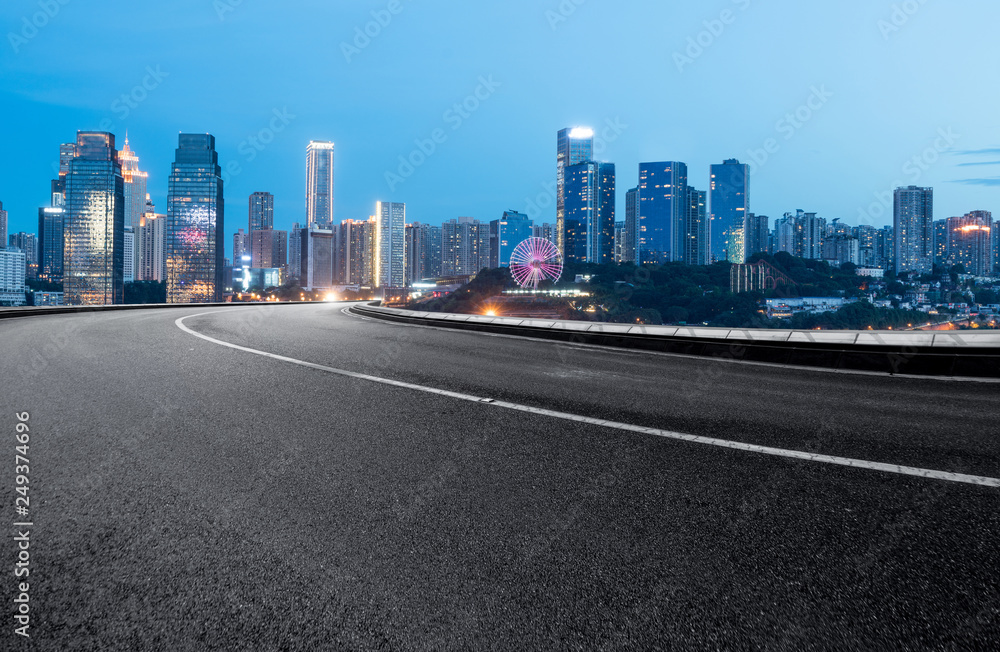 The expressway and the modern city skyline are in Chongqing, China.