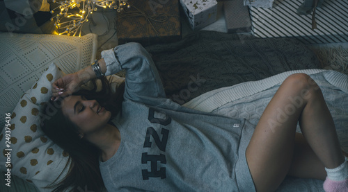 Girl in underwear in the pillows.